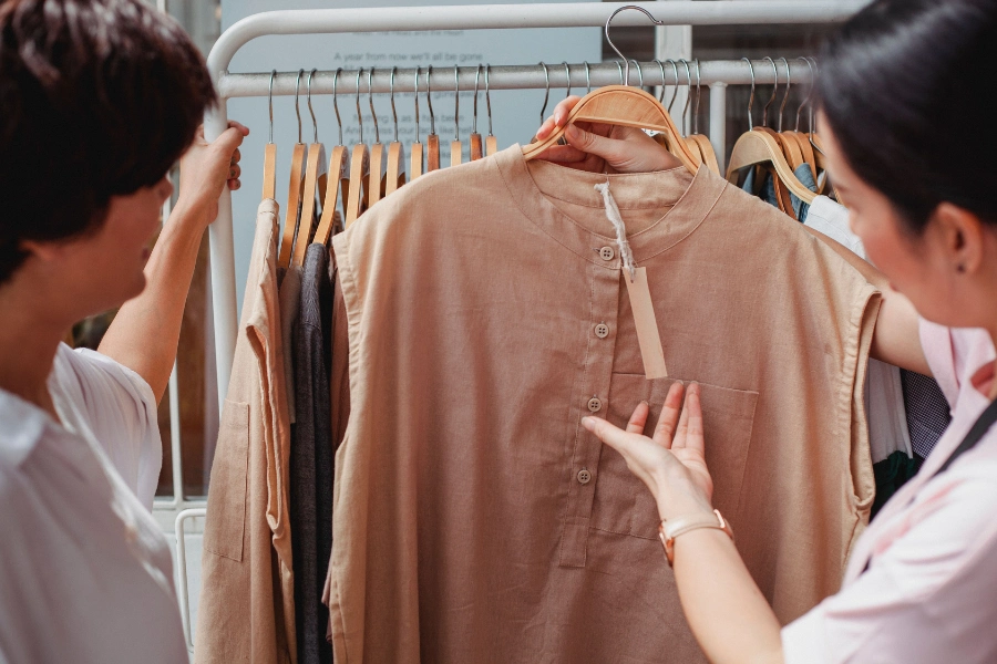 Woman planning stylish summer outfits with breathable clothing